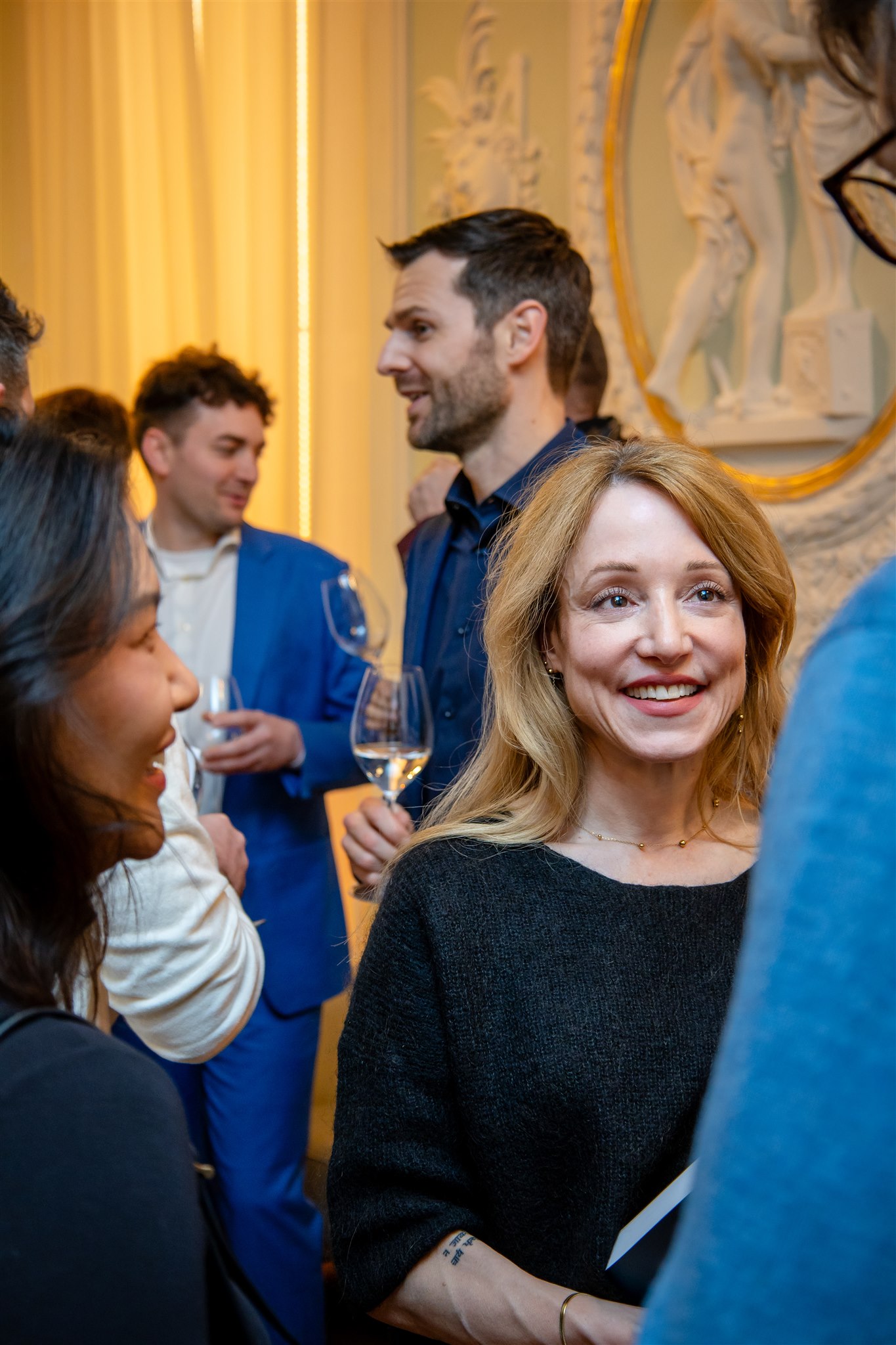 Guest smiling at camera during Recht KI book launch in Zurich