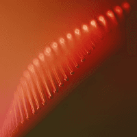 Abstract digital representation of a DNA double helix, symbolizing genetic risk screening and hereditary disease prevention.