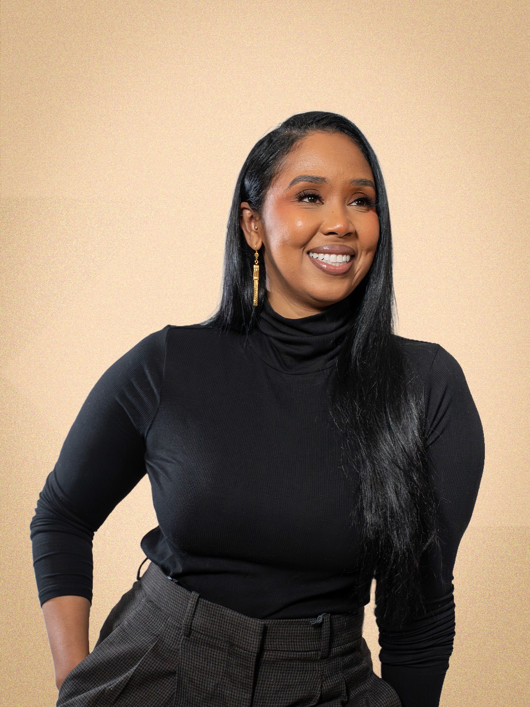 woman in black crew neck t-shirt wearing brown framed eyeglasses standing on rocky shore during