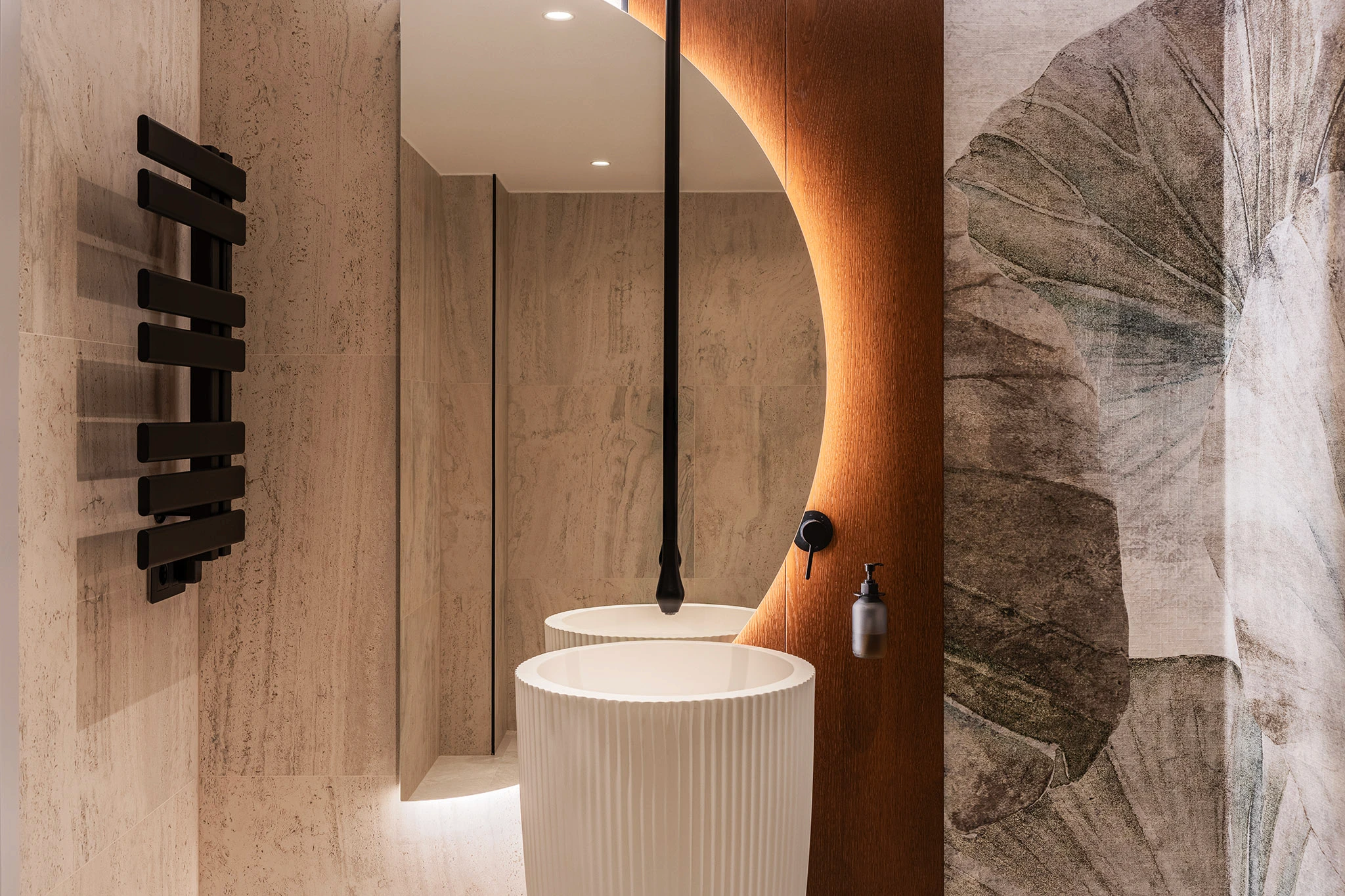 Villa Vista Marbella bathroom with sculptural arched wall niche and freestanding basin