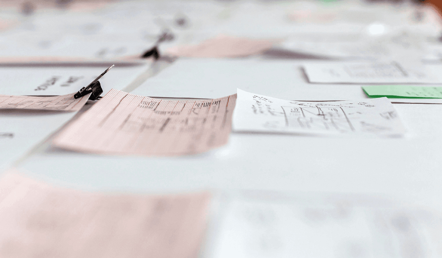 a man and a woman sitting at a white table