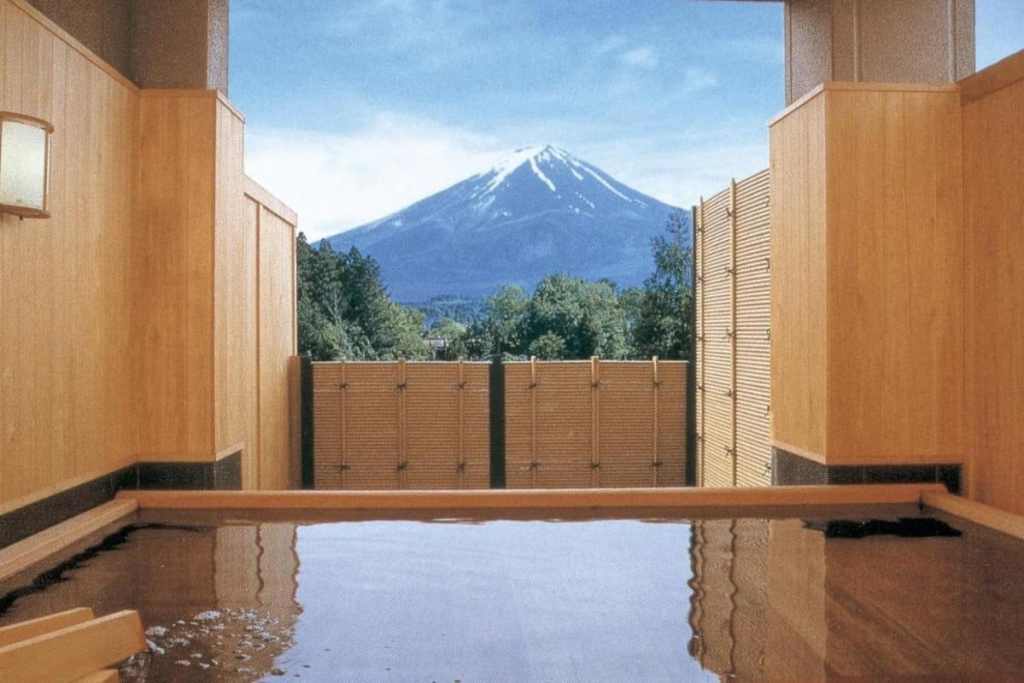 Traditional Japanese bath with view of Mount Fuji
