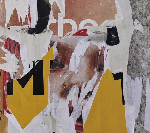 Close-up photograph of layered torn posters revealing partial text, a fragmented human face, and bold yellow shapes. The overlapping materials and exposed textures create an abstract study of time, advertising, and urban transformation.