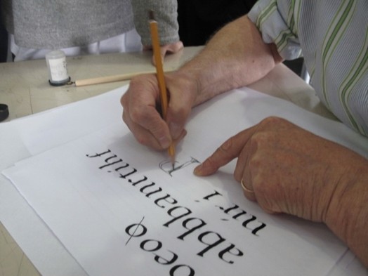man writing letters