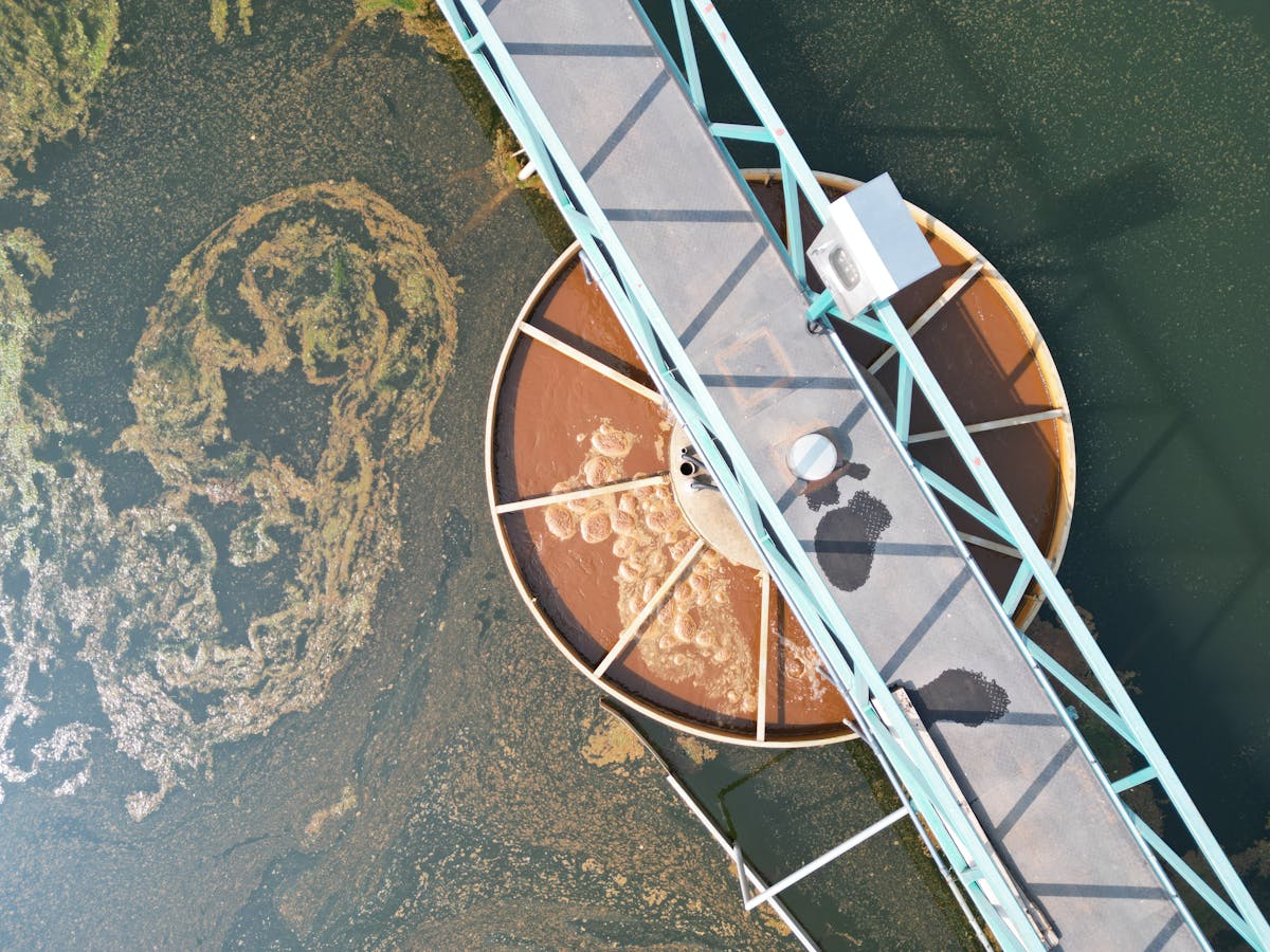 Aerial view of a water treatment facility and circular tank