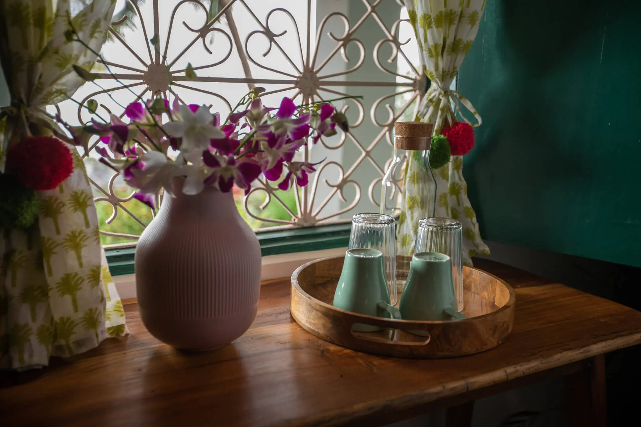 Fresh orchids and welcome tray in the Sea View Family Room at Casa Jaali