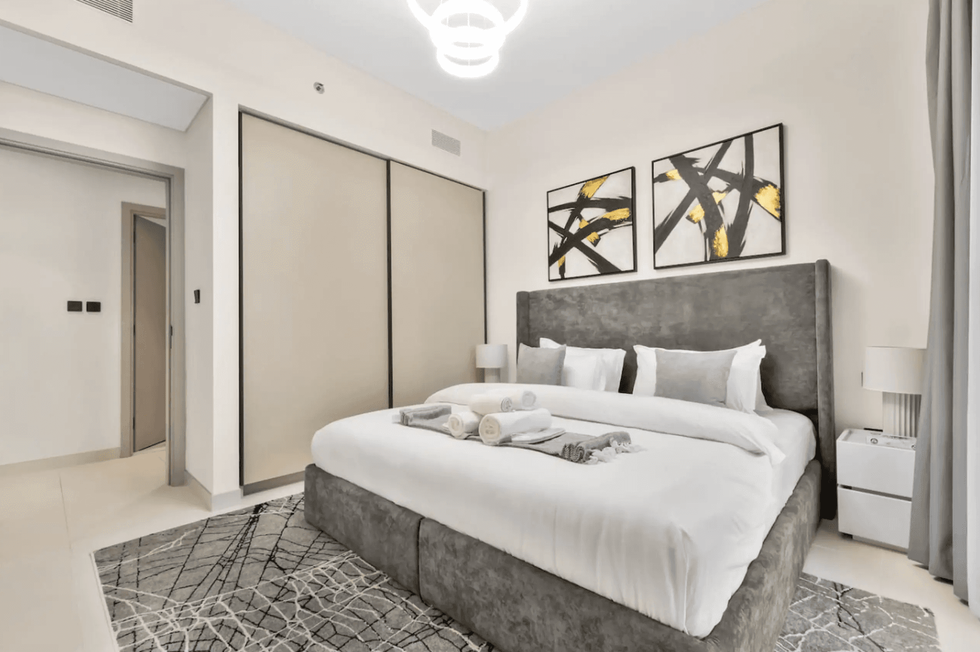 white mattress beside sectional sofa