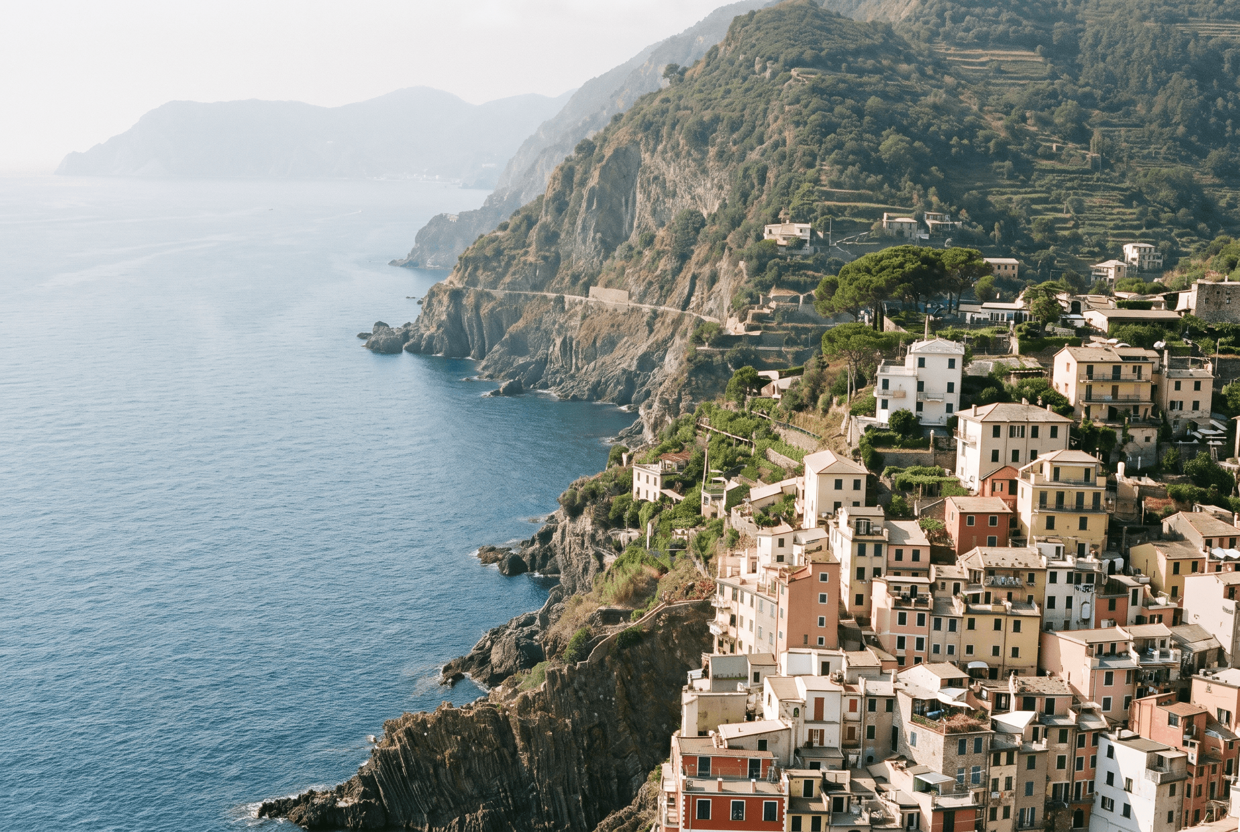 Colorful clifftop village on the Italian Riviera overlooking the Mediterranean