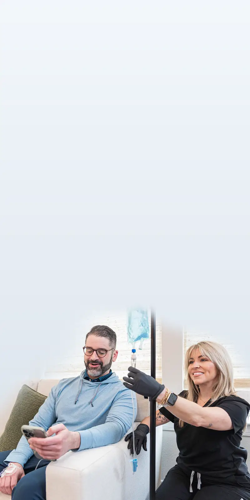 Man receiving IV for wellness support