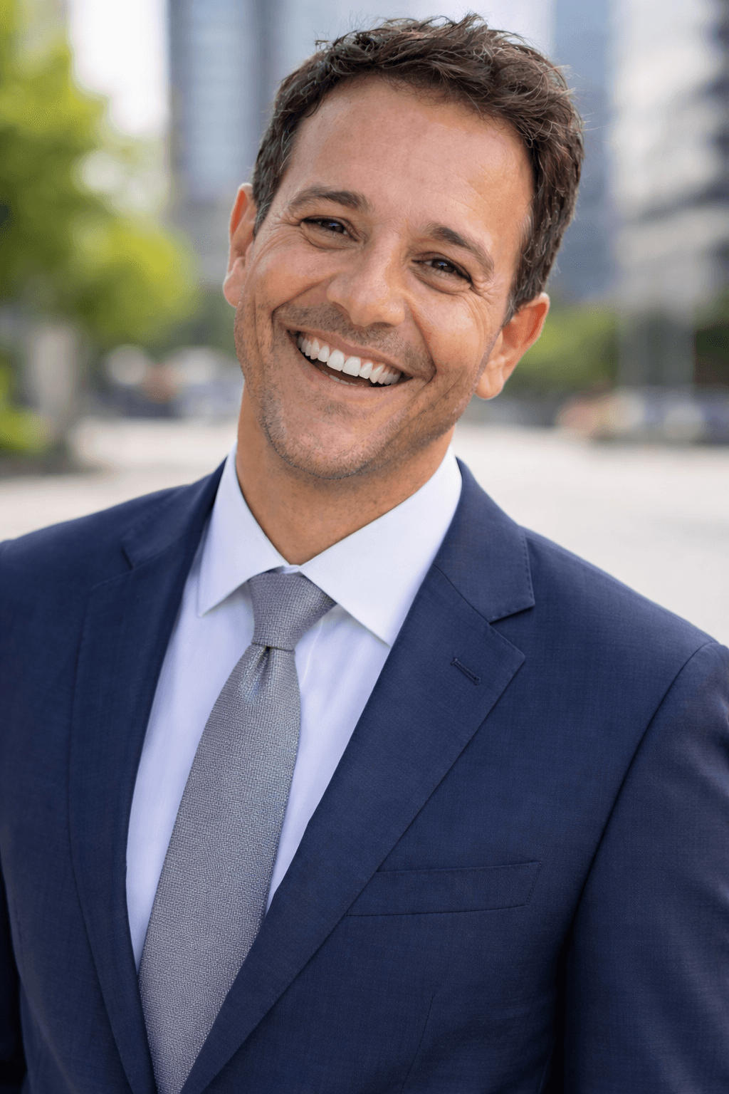 woman in white scoop neck shirt smiling