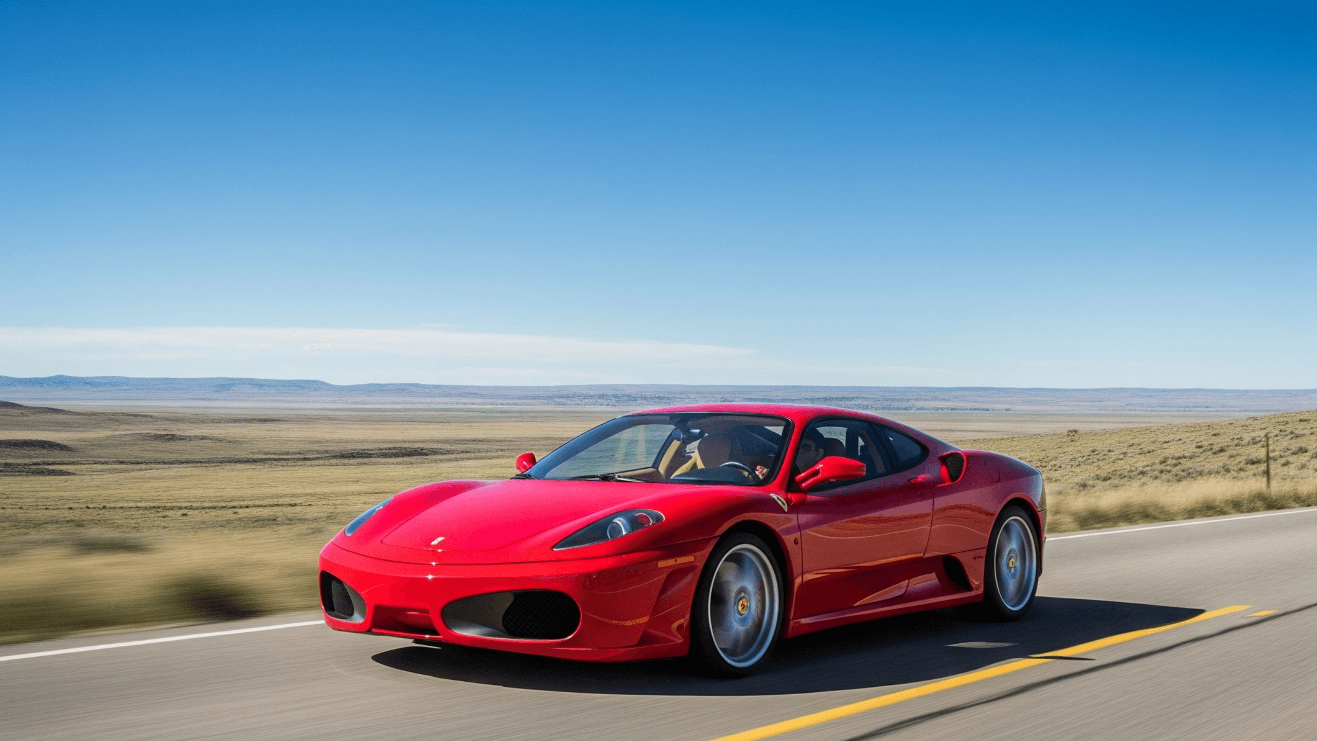 Ferrari F430 supercar on scenic coastal road – comprehensive buyer's guide to the last gated-manual V8 Ferrari