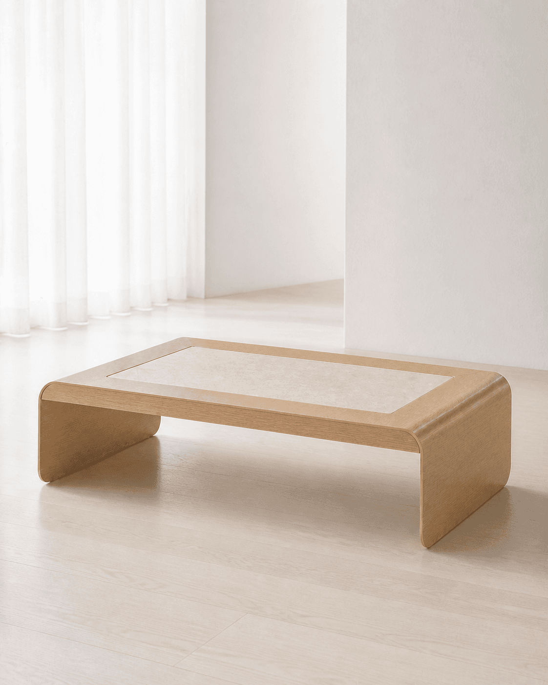 Arc Fold Coffee Table placed in a luminous, minimal white interior