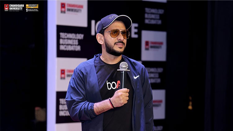 a man holding a microphone in his hands