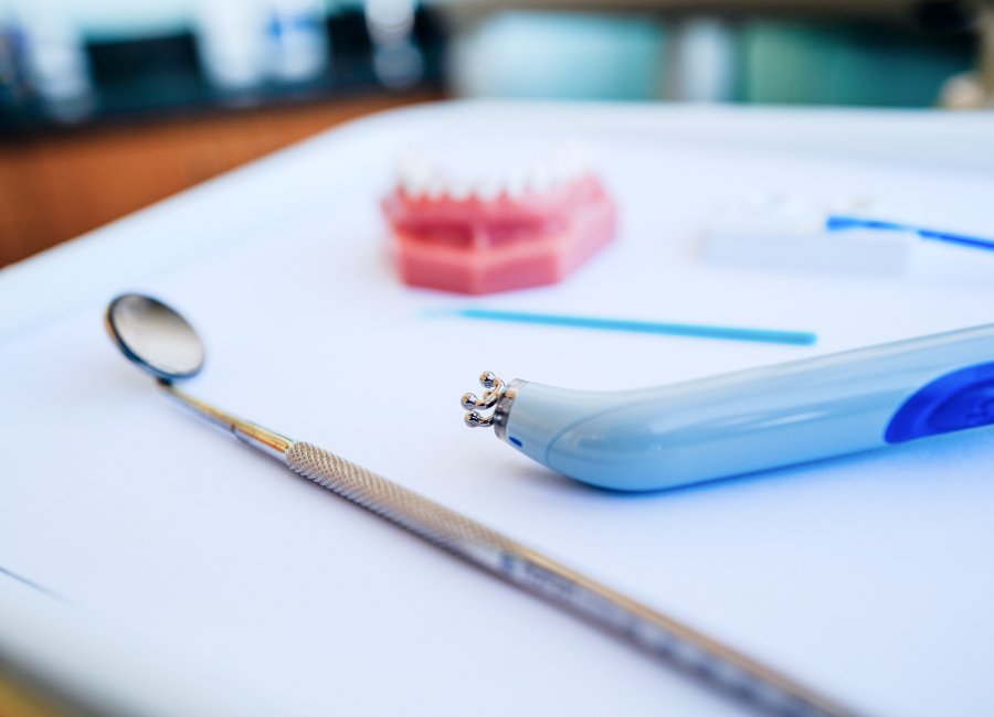 Dental tray with teeth and dentist tools