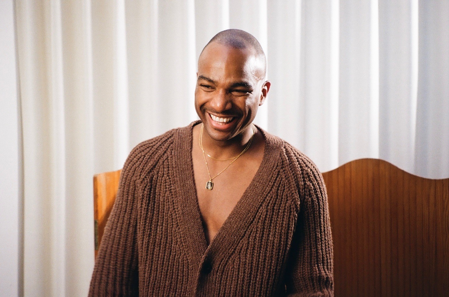 Streetside billboard with flyposters of the Batch.Works brand and illustrations