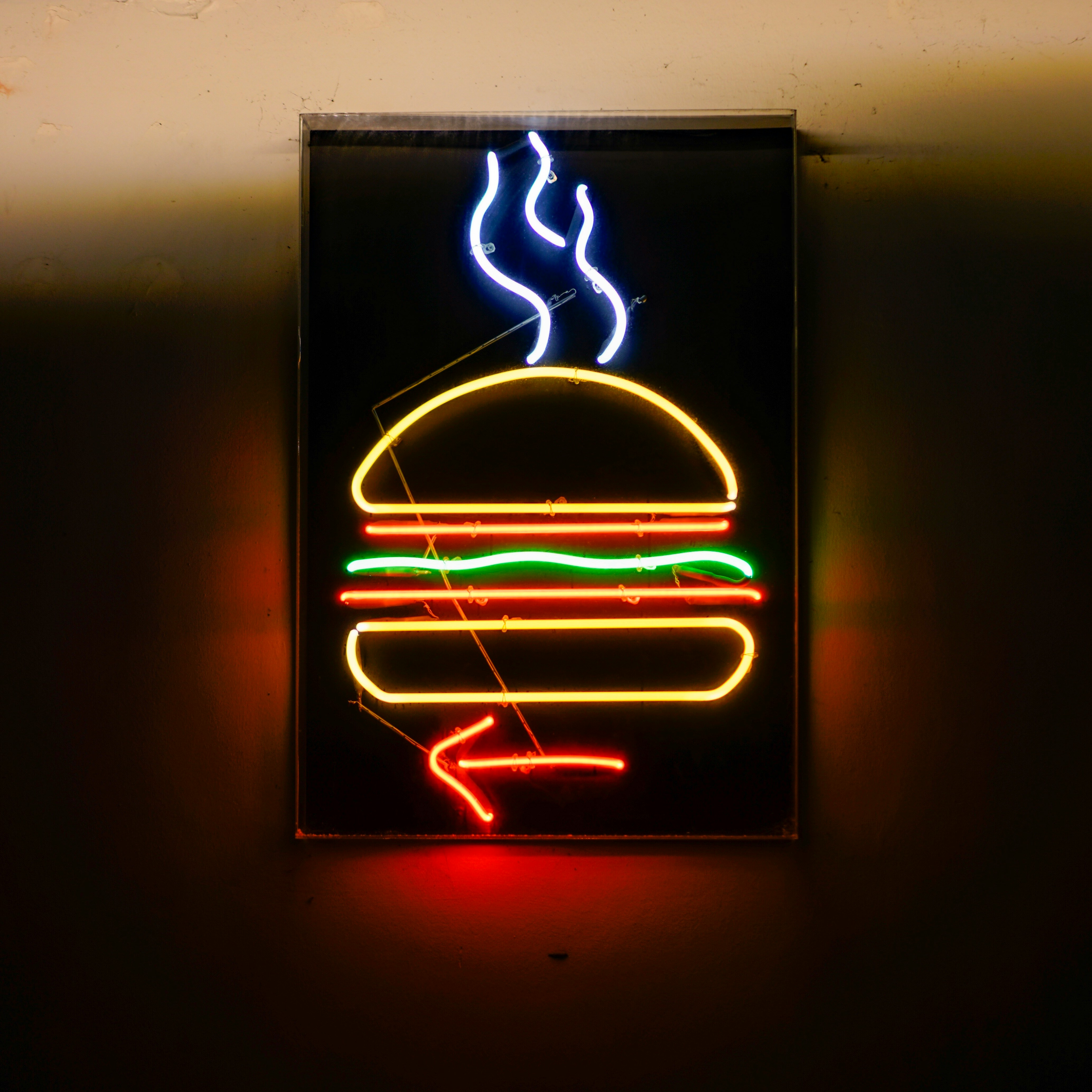 turned-on burger neon sign