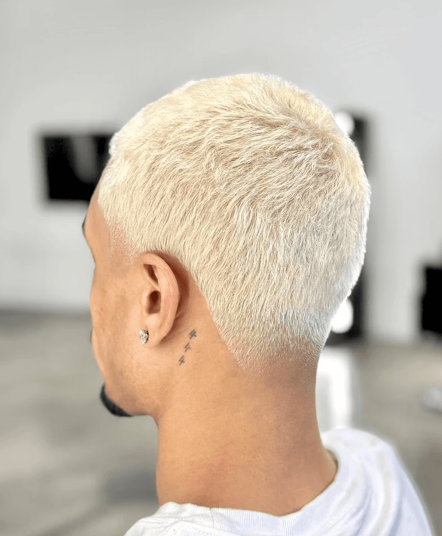 Low taper fade haircut featuring short textured finish by Courtney Palmore, perfect for low maintenance men’s styling. The Rich Barber Hair Studio West Hollywood, California.  Los Angeles