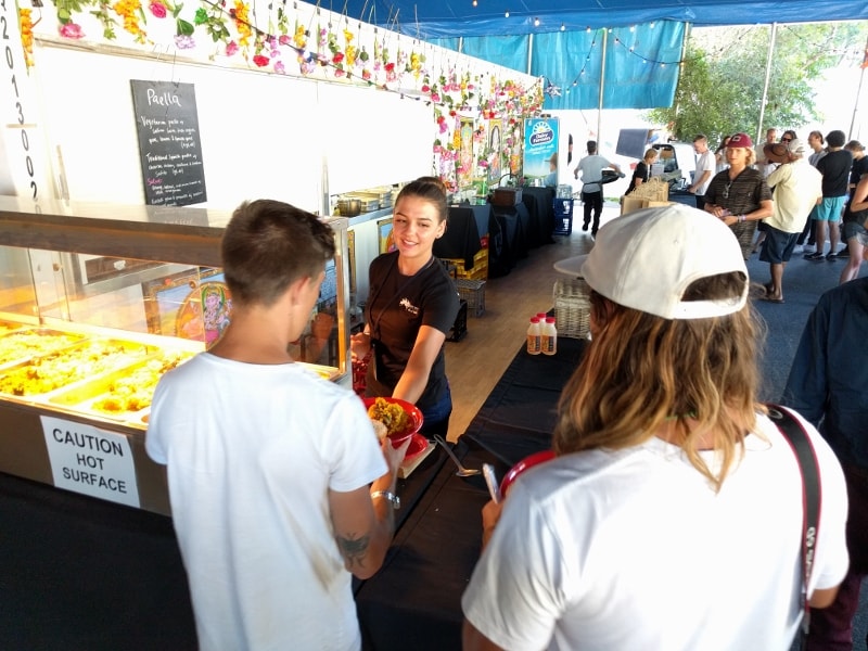 Food staff serving festival goers at Falls Festival Byron Bay in 2015