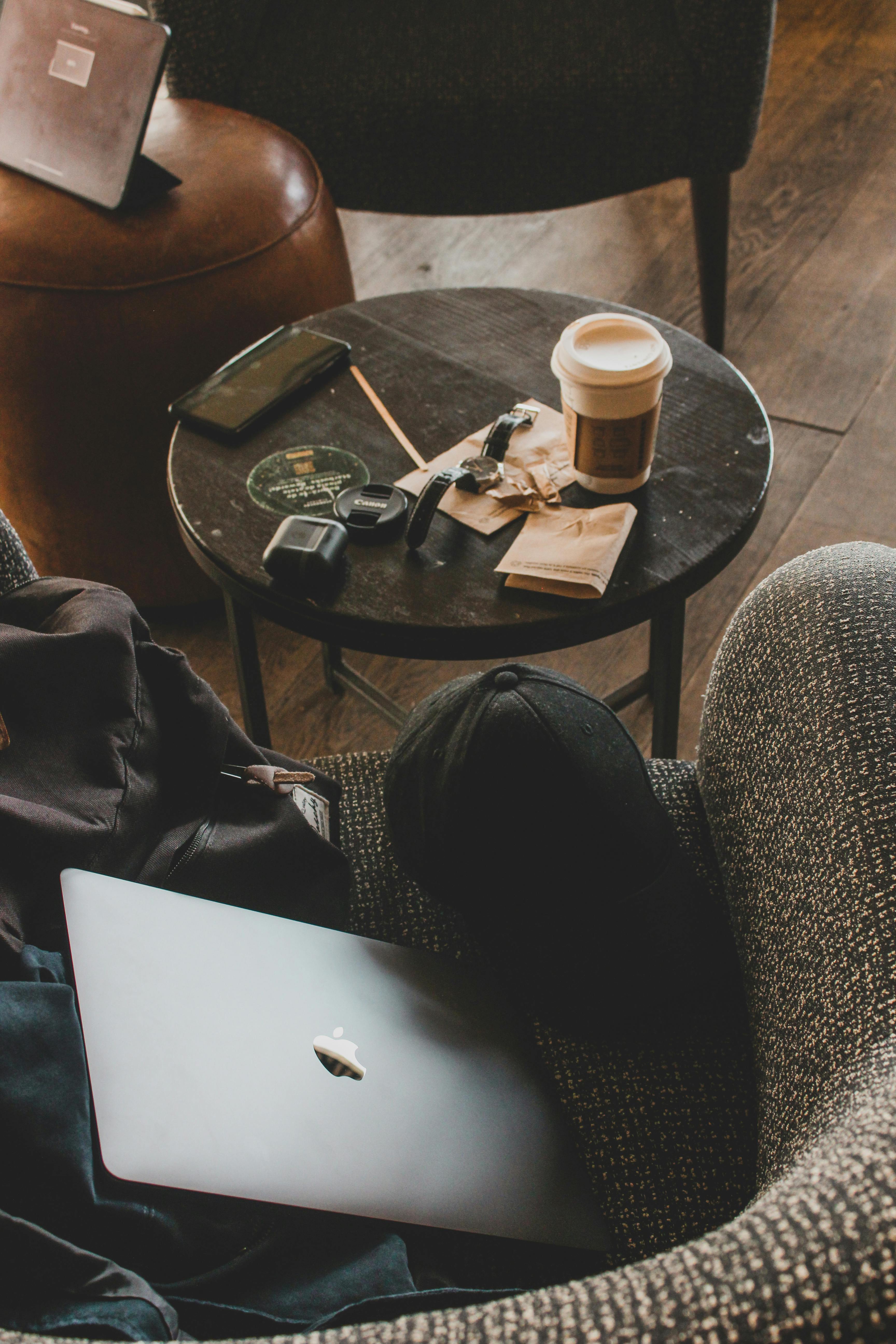 person sitting in a chair in front of a man