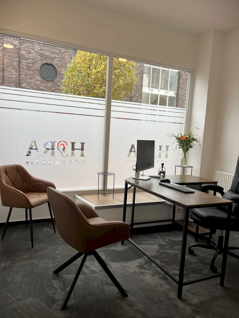 black flat screen tv on brown wooden table