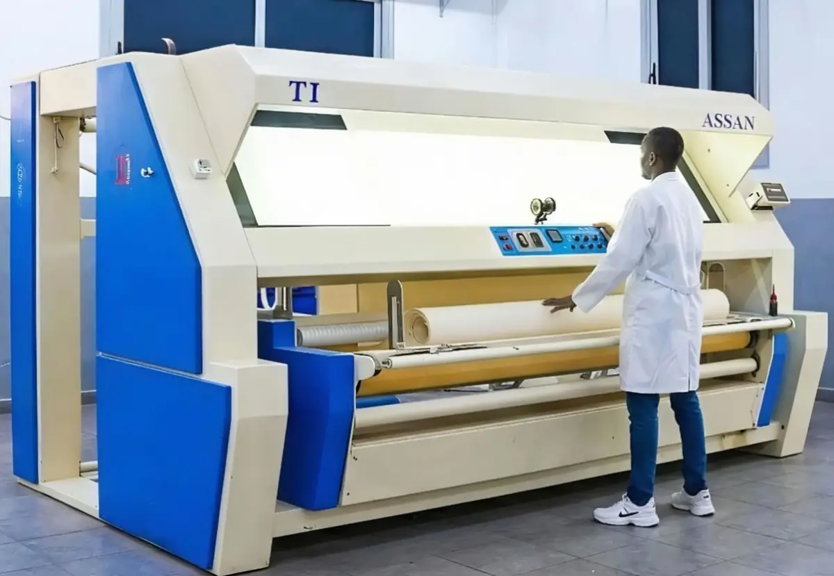 Industrial fabric processing machine.