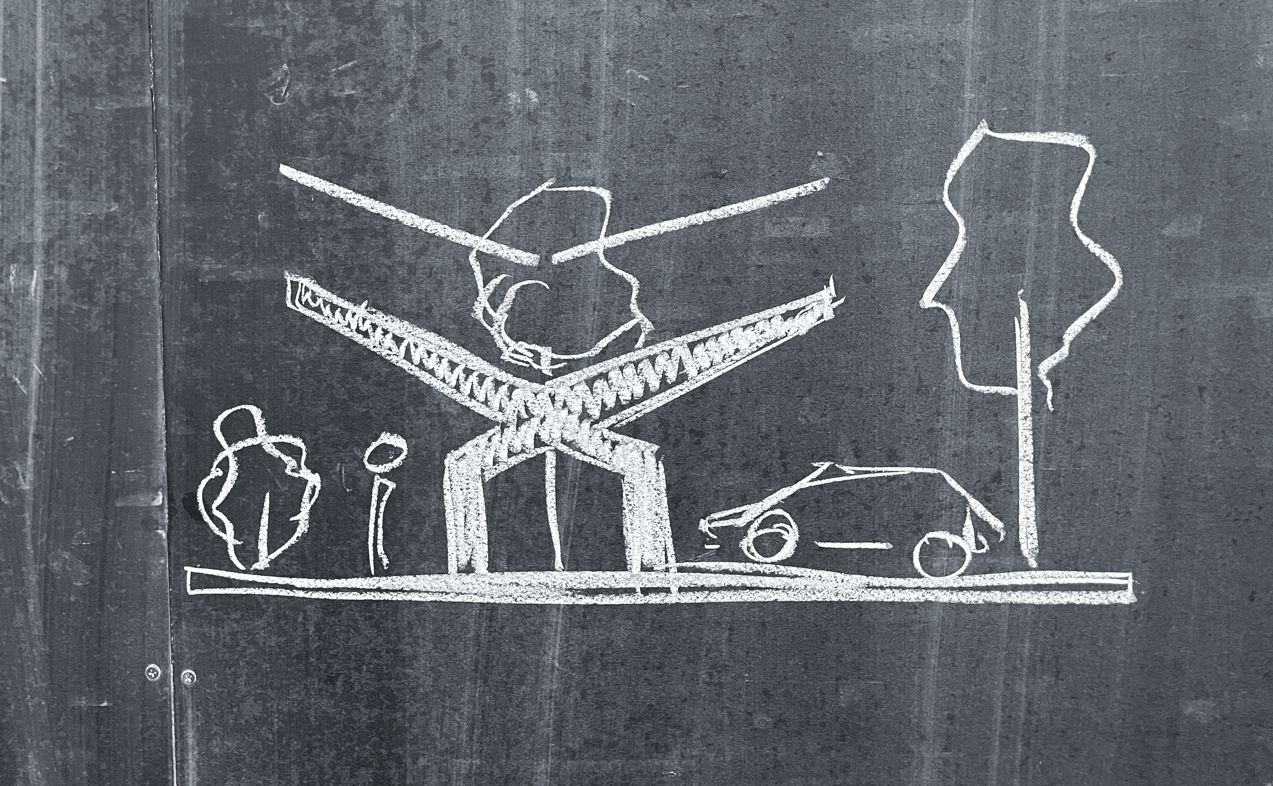 Scheibenmodell aus Holz vom tegut... teo, fotografiert auf einer Hand.