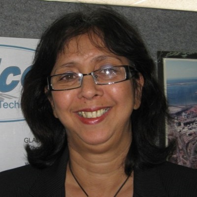 Man in sunglasses with autumn leaves.