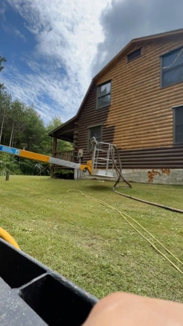 Log cabin sandblasting by Rochester Sandblasting