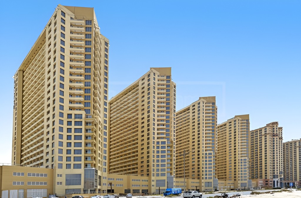 A vacant road with a backdrop of tall buildings, highlighted by the presence of Lakeside Tower.