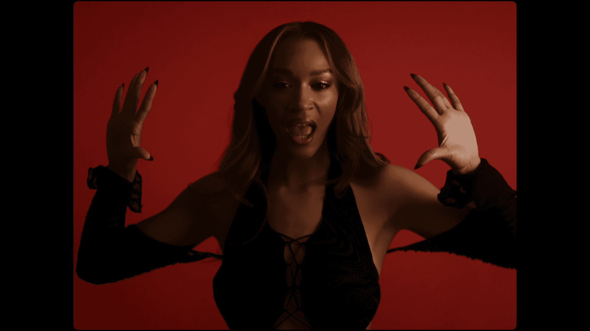 Lady Gaga playing piano