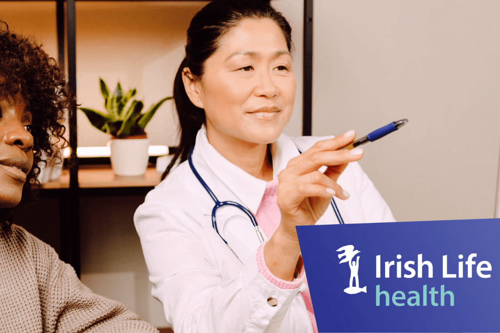 Female doctor in Irish hospital explaining health insurance plans using a tablet, symbolising informed healthcare decisions