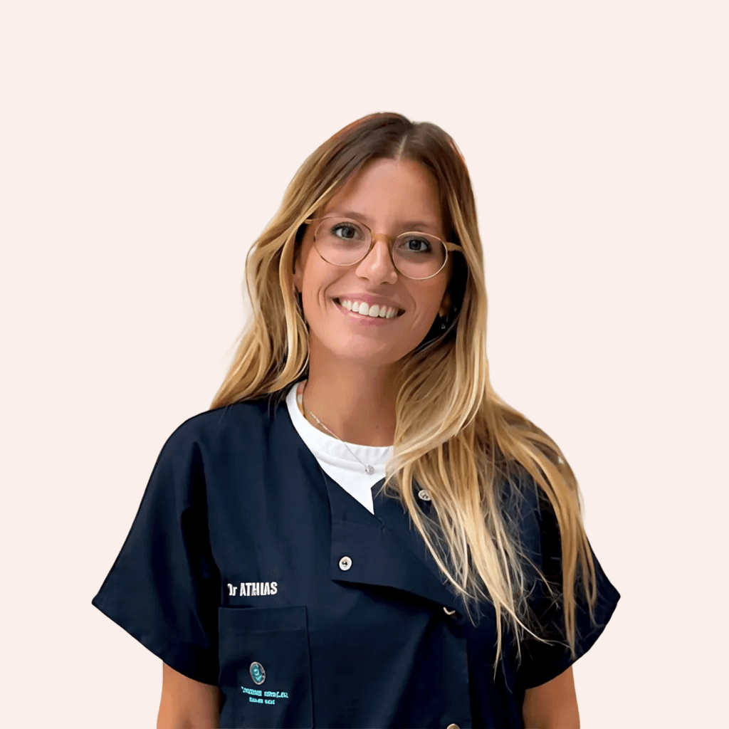 Portrait of a woman with long red hair and closed eyes, gently touching her face with both hands