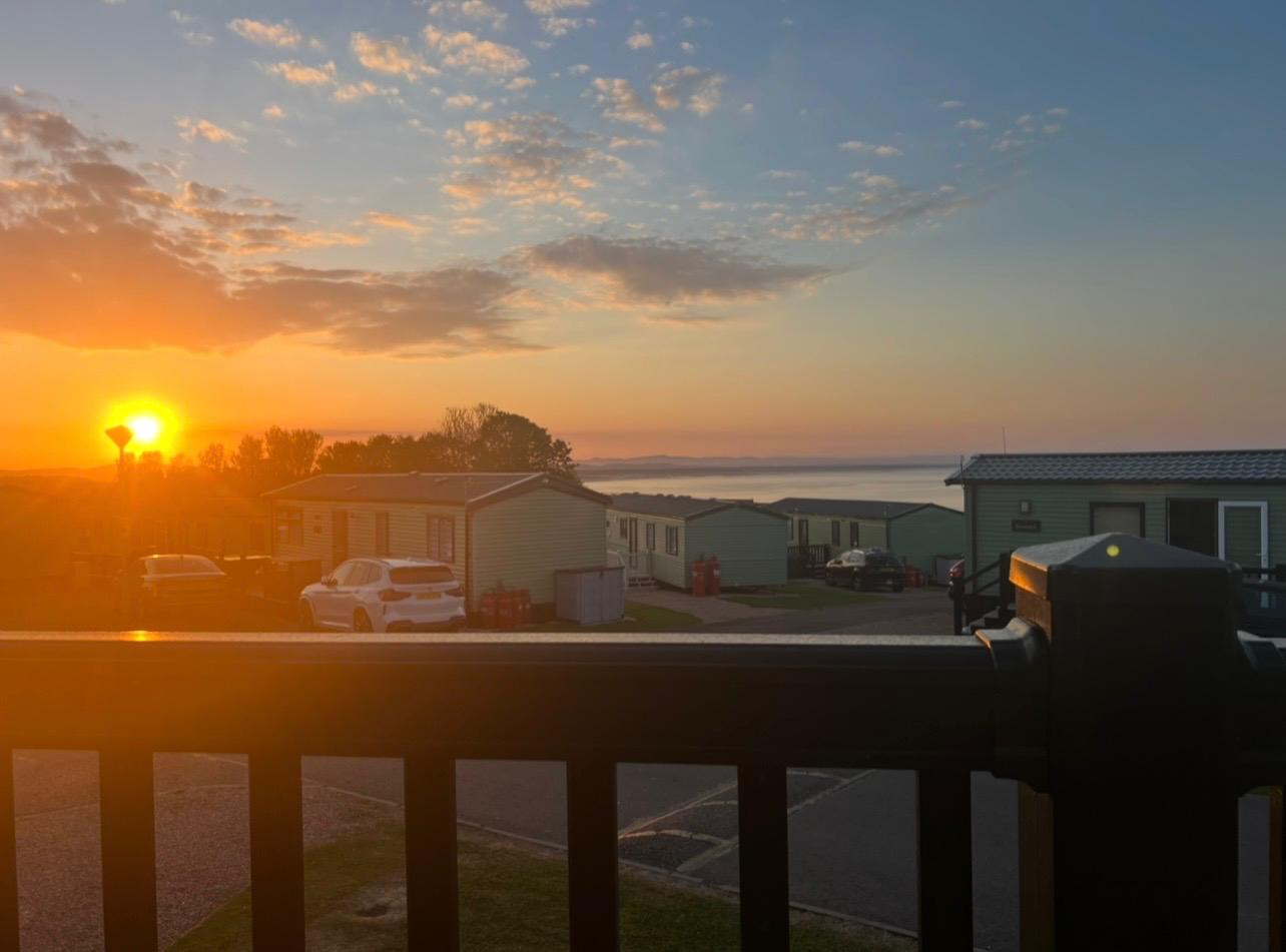 Sunset photo from the decking of Pippa Cabin