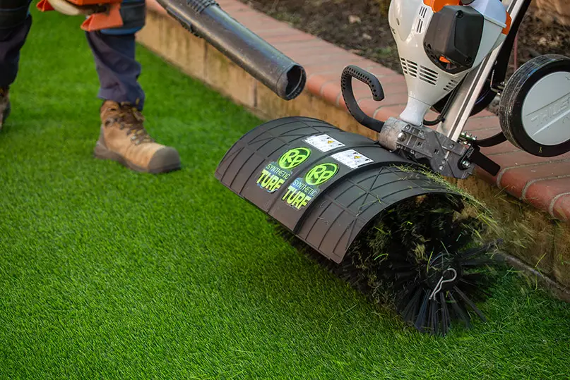 Power brushing and restoring synthetic grass in Fontana, CA