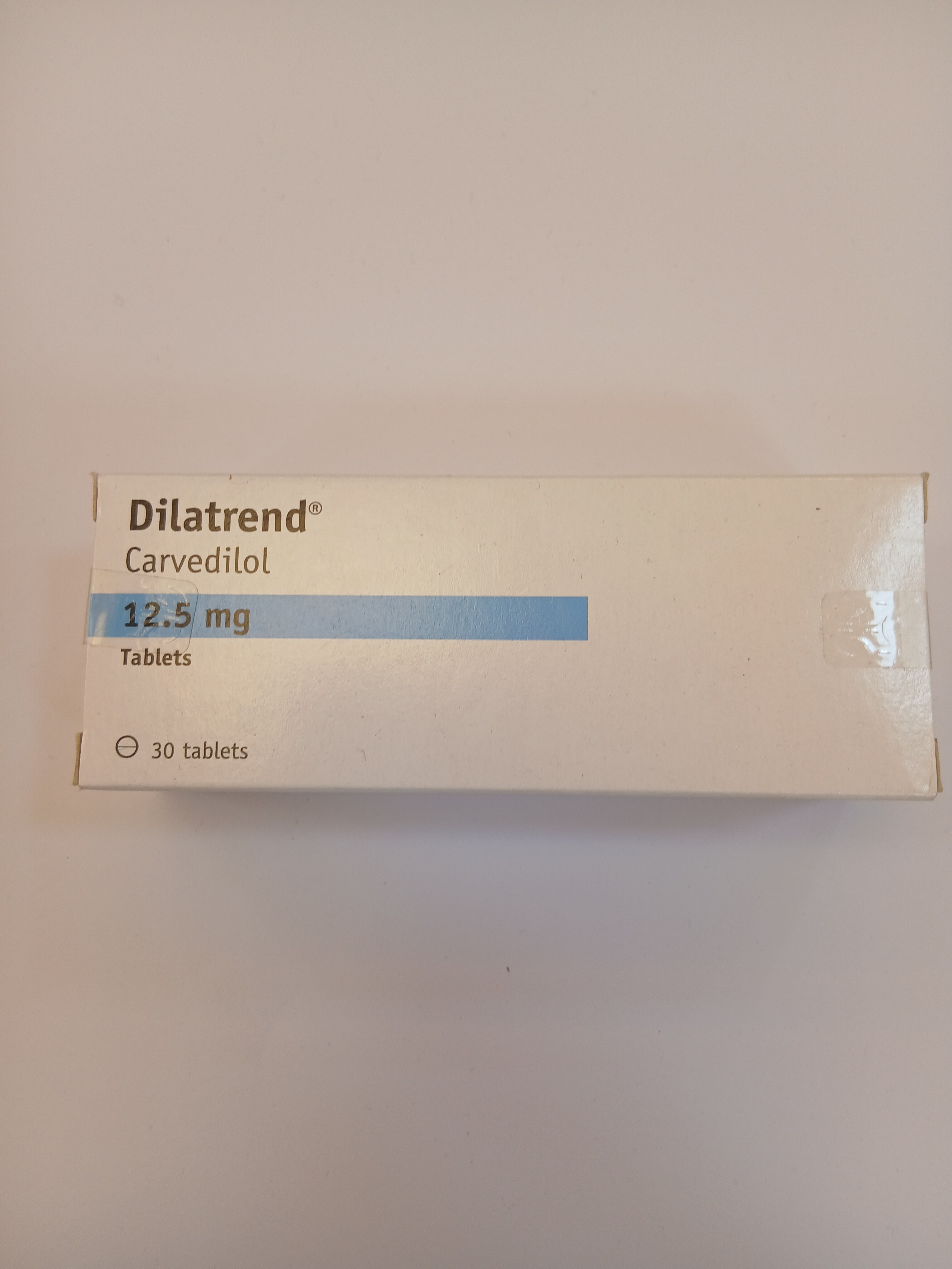 Dilatrend carvedilol 12.5 mg tablets, white cardboard box containing 30 tablets.