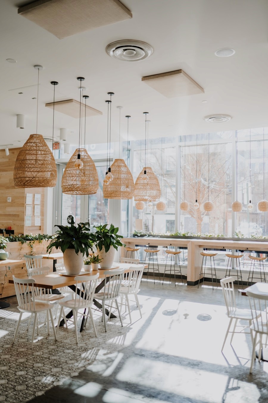 Café interior with rattan pendant lights and timber joinery
