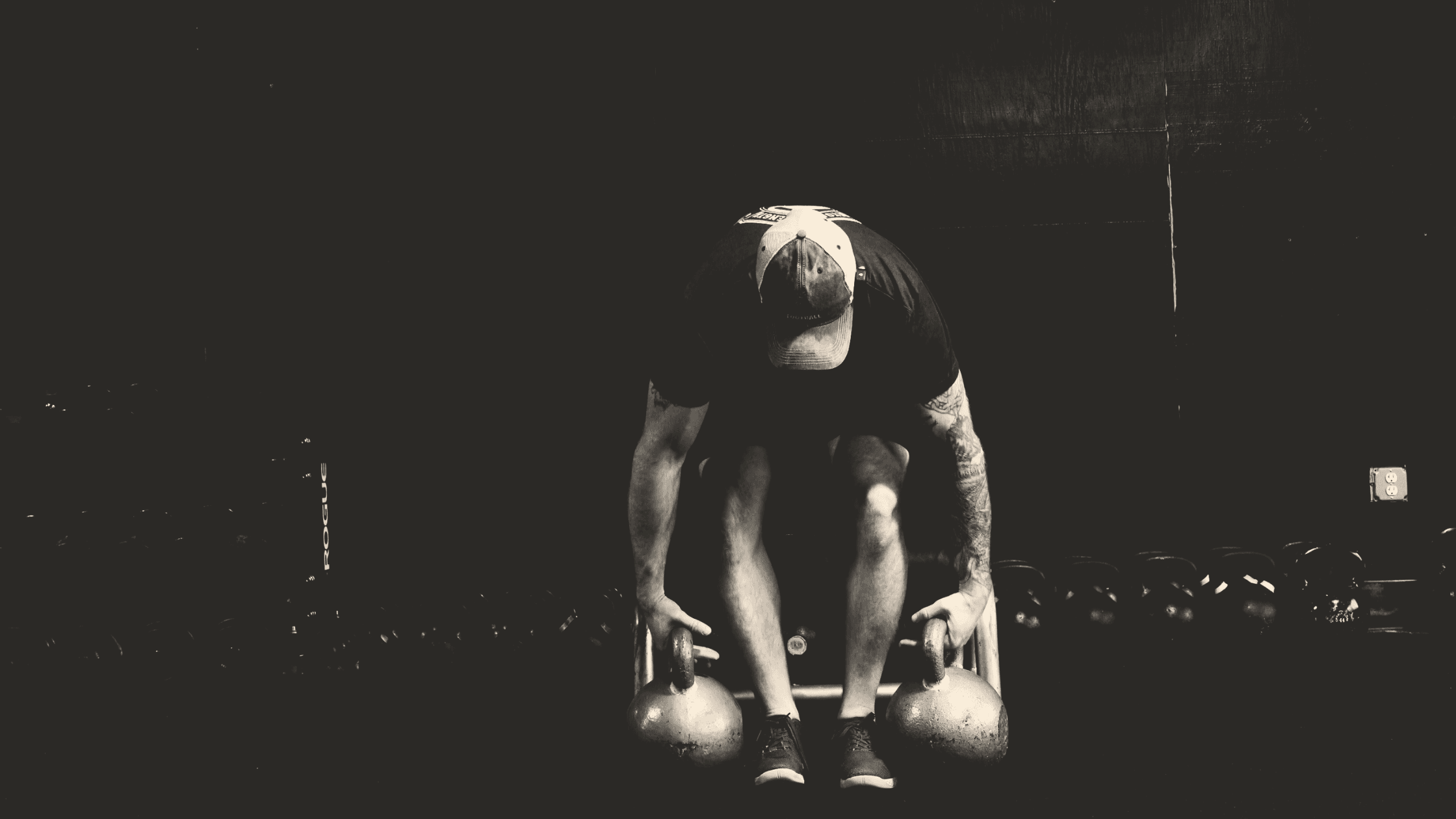 split squats with heavy kettlebells