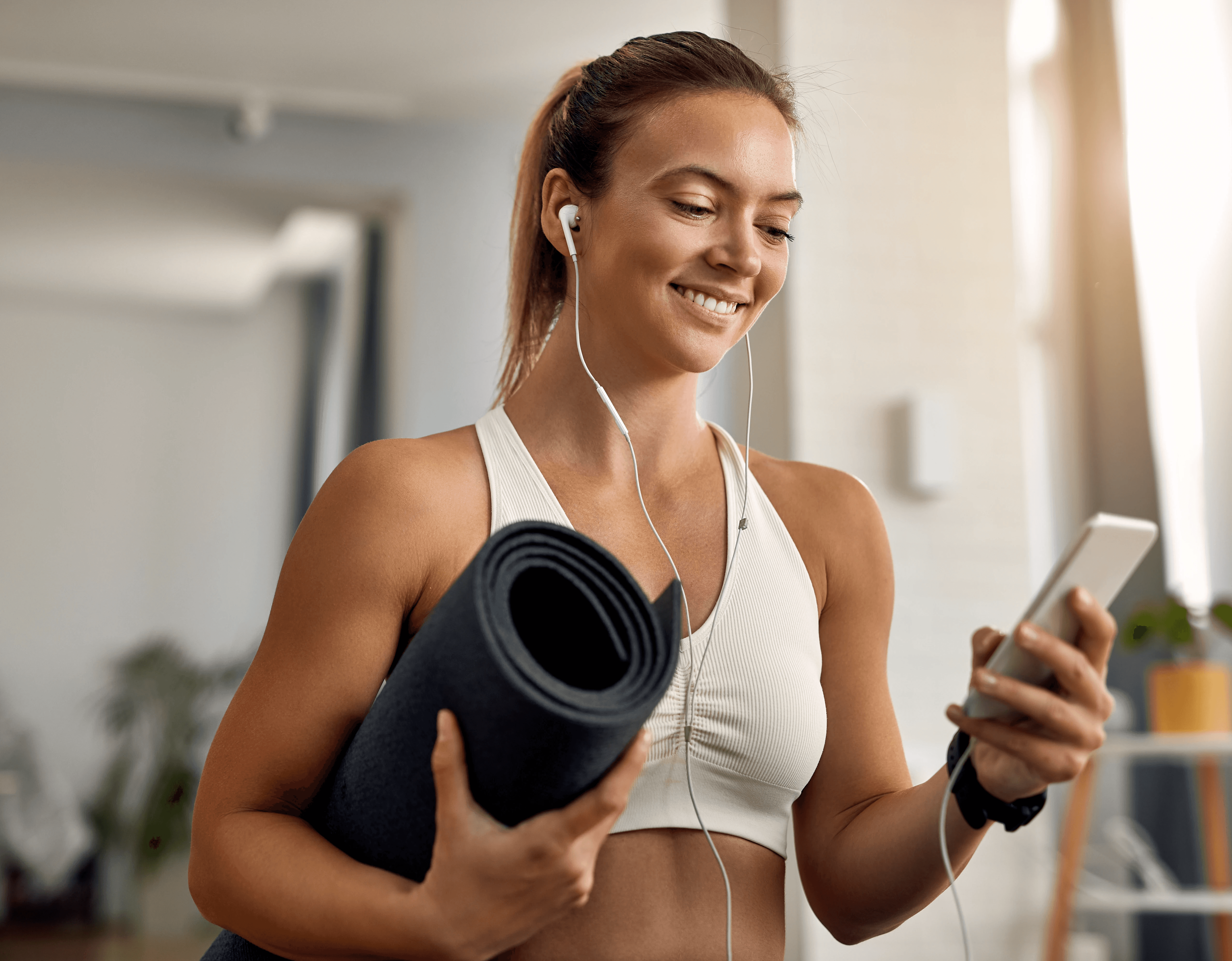 a man running on a treadmill in a gym