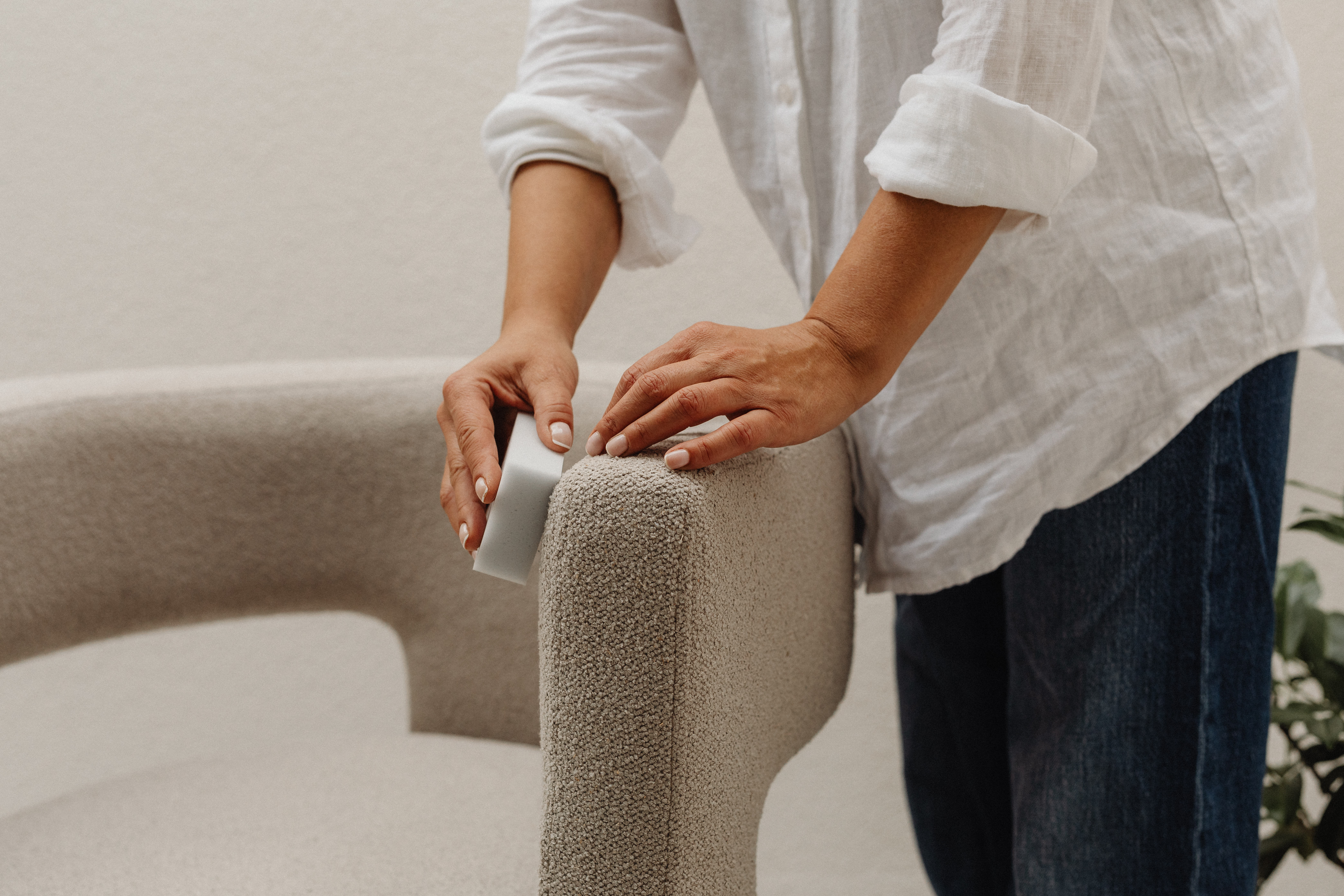Woman scrubbing a chair