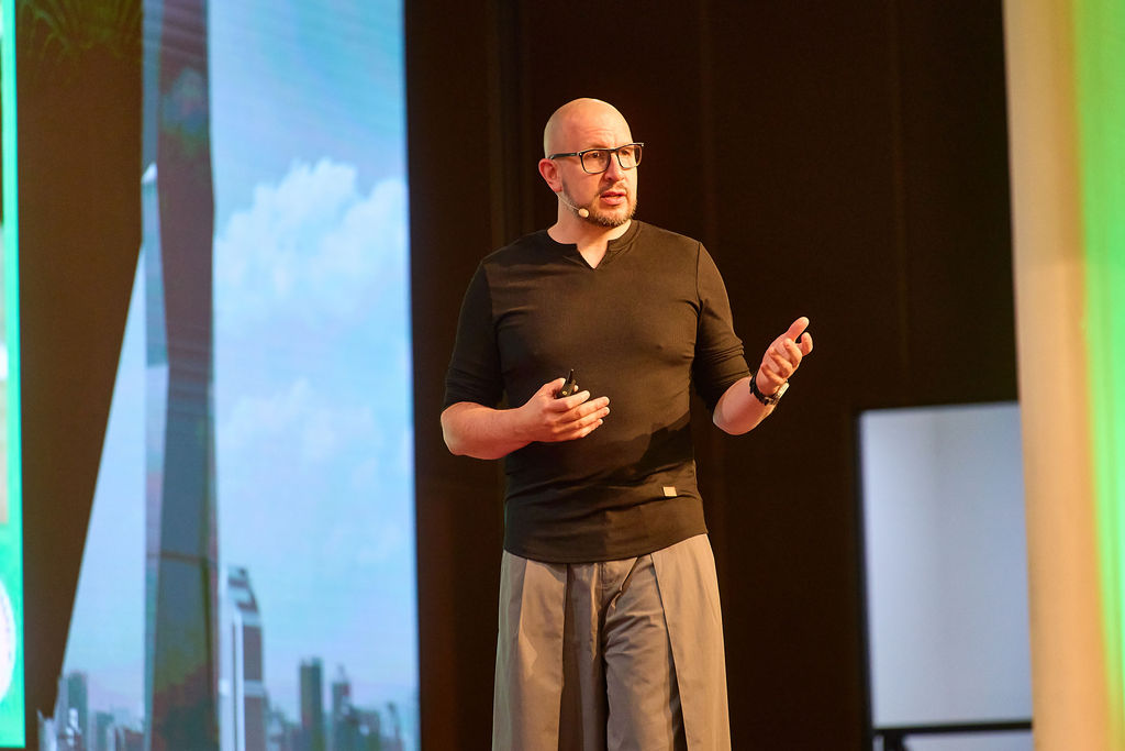 person writing on a piece of paper