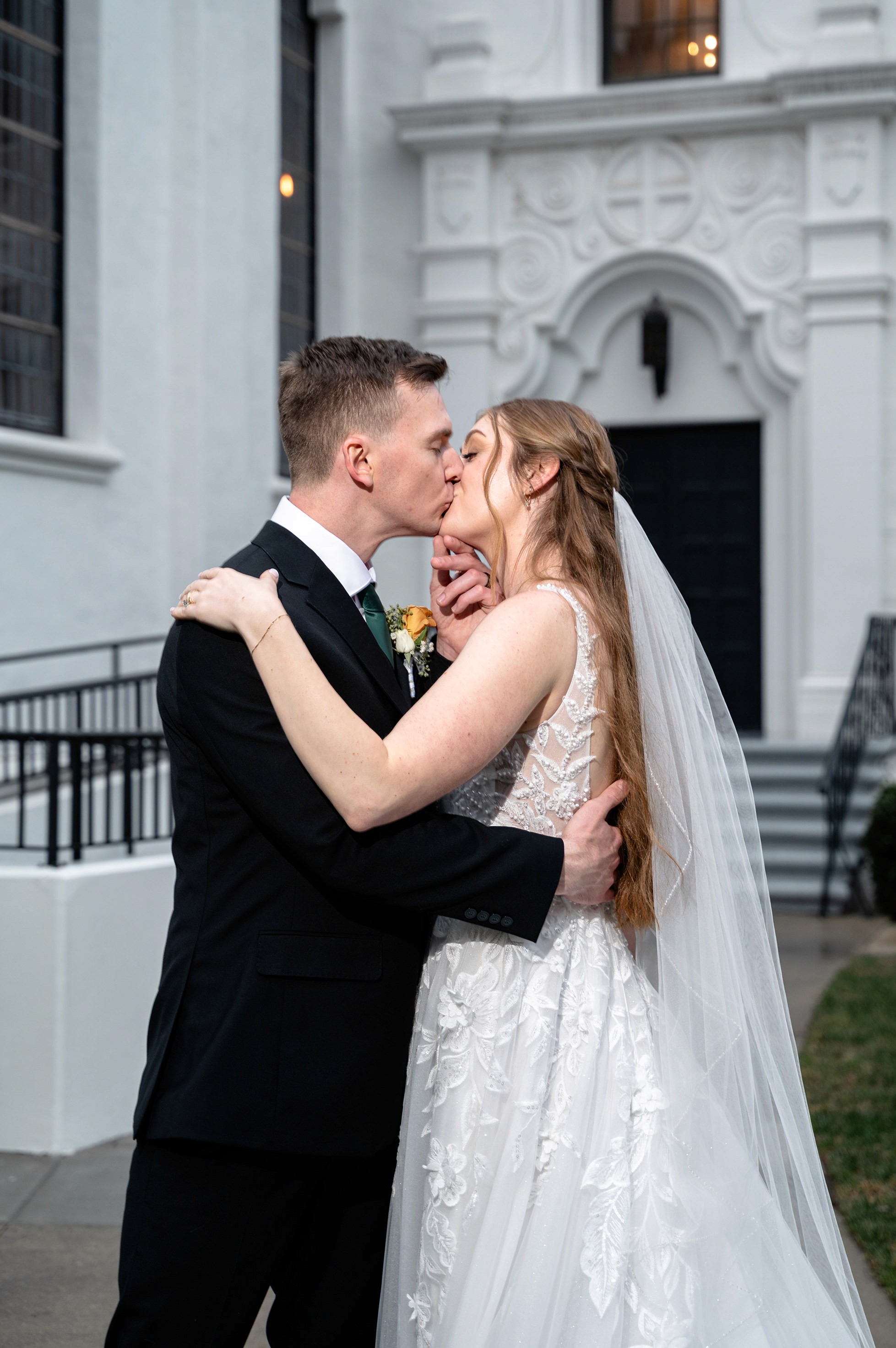 Flat lay wedding details with bouquet, rings, and sparkling bridal heels