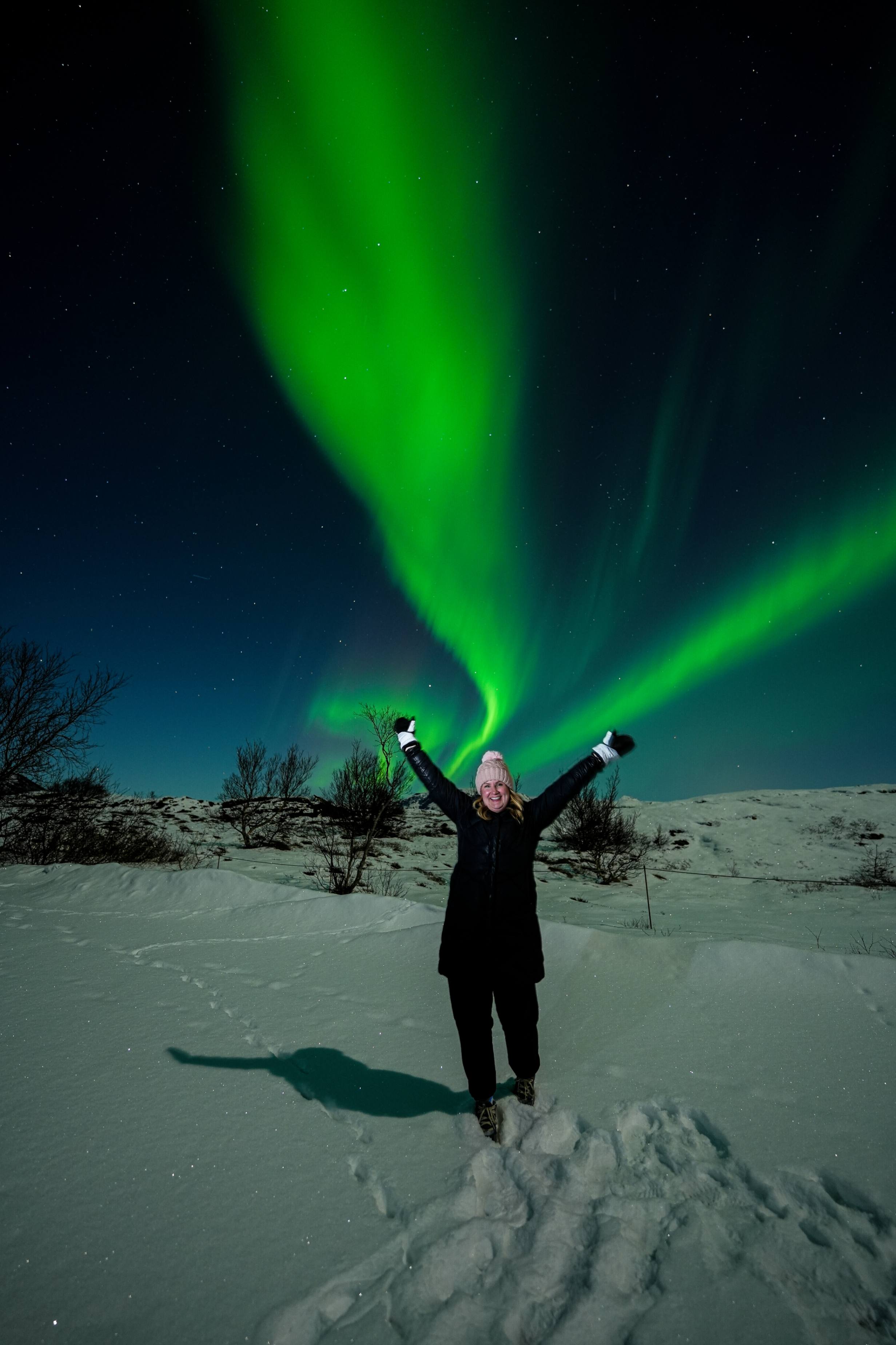 Northern Lights tour photography from Aurora Experts in Iceland, featuring guests beneath the aurora, winter landscapes, and vivid skies over remote Icelandic locations.