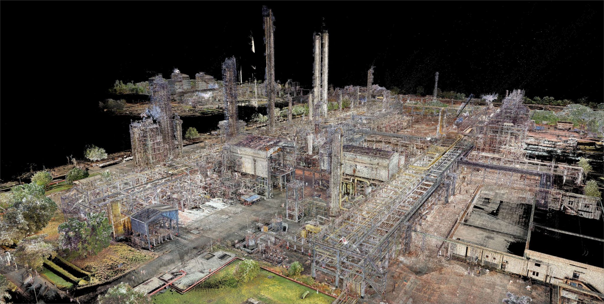 A close up of pipes and pipes in front of a tree