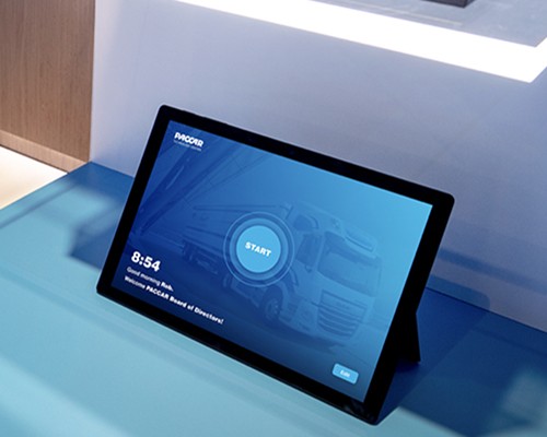 A tablet displaying the start screen for an information experience