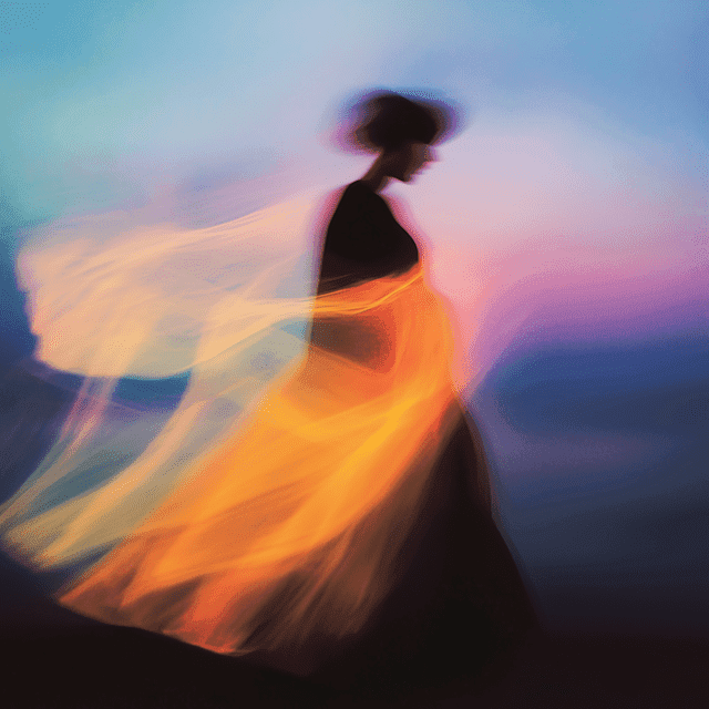  A woman in a flowing dress appears to be walking gracefully in mid-air against a clear blue sky.