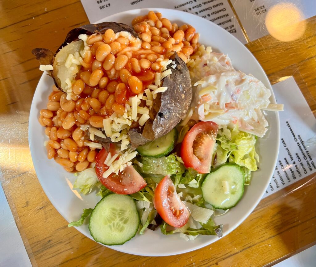 Sumptous breakfast of chilli beans, salad, coleslaw with jacket potatoes