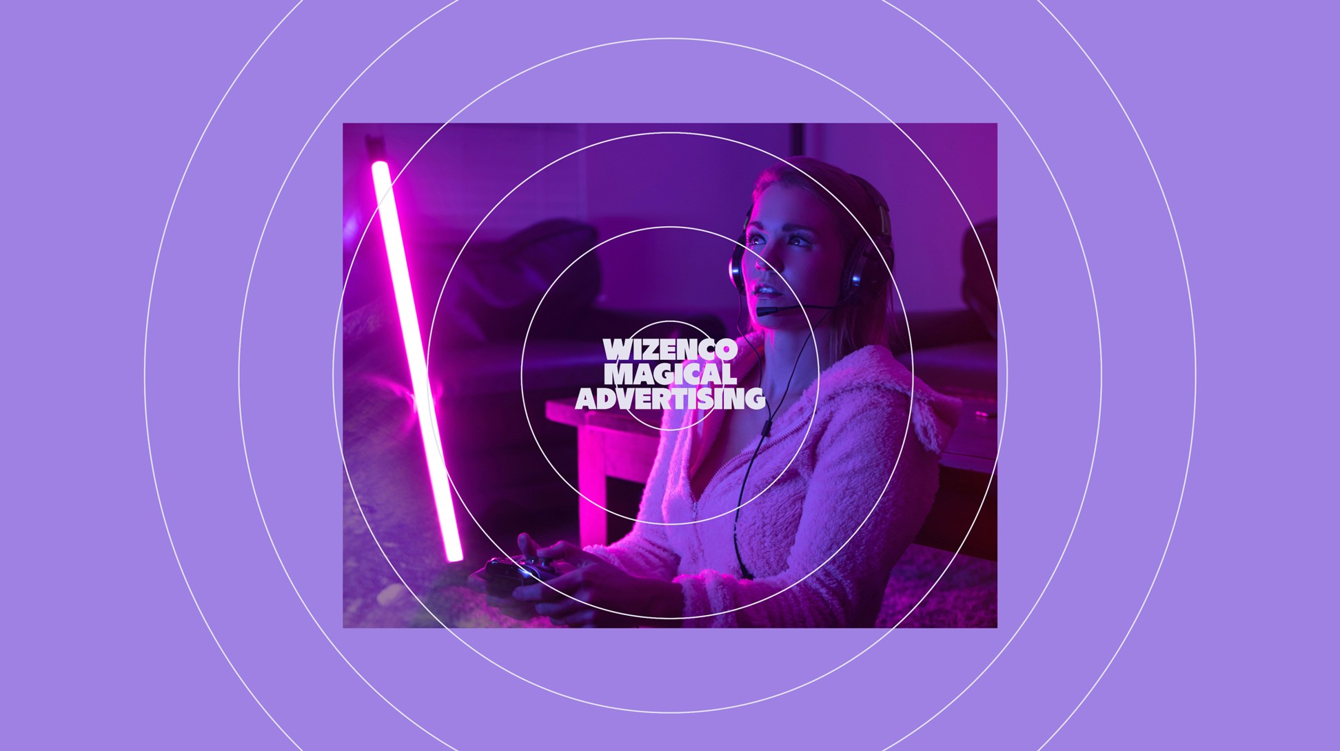 Wizenco. Magical Advertising. + photo d'une joueuse de jeux vidéos.
