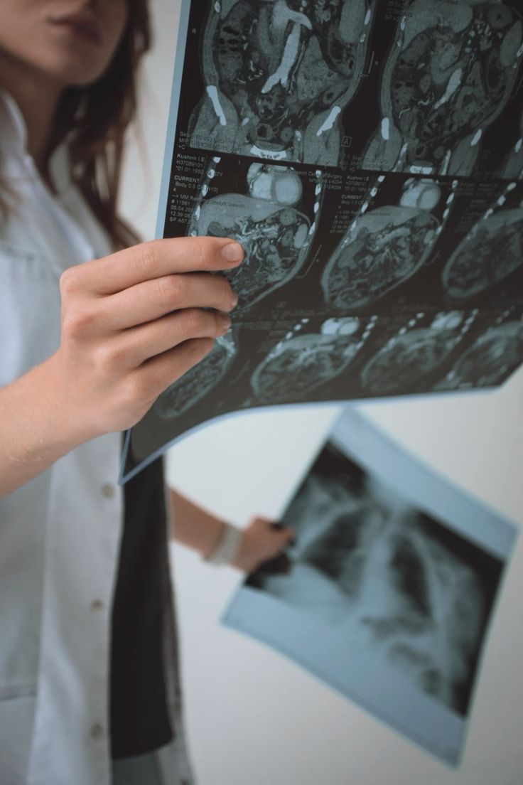 Doctor examining a patient's report