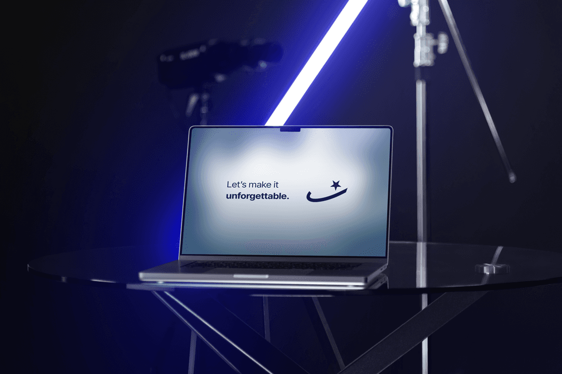 Sama Agency digital mockup on laptop screen with tagline ‘Let’s make it unforgettable.’ Modern media production and marketing agency branding in Saudi Arabia.