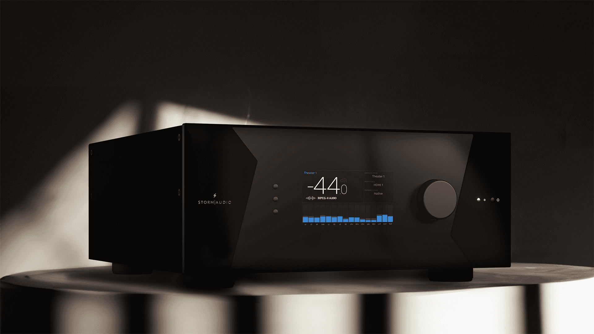StormAudio receiver with display and volume knob.